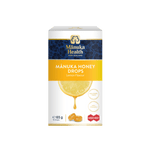Manuka Health Mánuka Honey Drops packaging on a green background